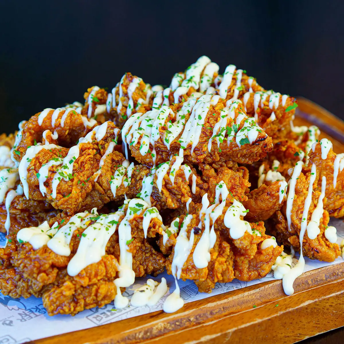 Soy Teri glazed Korean fried chicken with creamy drizzle